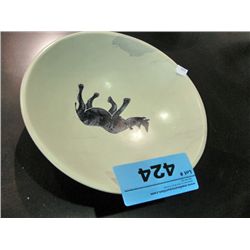Hand crafted stone carved bowl with black rhino