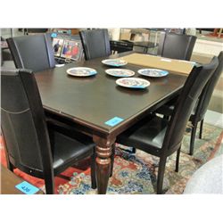 Cherry finish dining room table with one leaf and