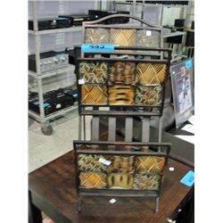 Folding metal magazine rack