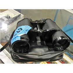 Set of tasco binoculars with case