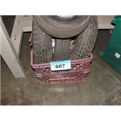 Purple milk crate filled with assorted utility