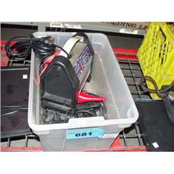 clear plastic storage bin of assorted tools etc