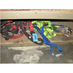 Shelf lot of assorted safety harnesses