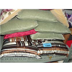 shelf lot of assorted bedding and throw cushions