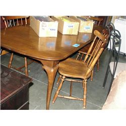 Maple dining room table with one leaf and 5 chairs