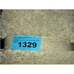 Small off white shag area rug
