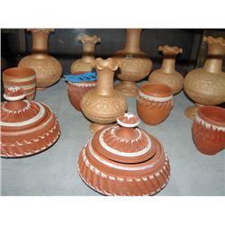 Lot of hand crafted clay wares; vases, lidded bowl