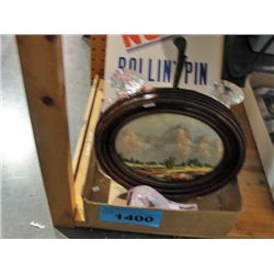 Box of assorted decorative items; candle holders,