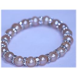 87.35 CTW PEACH PEARL AND CZ BRACELET