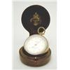 Image 1 : A brass-cased pocket barometer by Callaghan & Co, New Bond St, with silvered dial, in folding lea...
