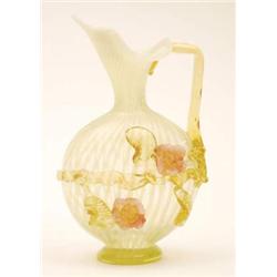 A vaseline glass ewer sprigged with coloured flowers, 8.5ins £100-150...