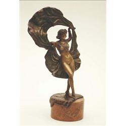 A Bergmann bronze figure of an erotic dancer, young female raising hinged skirt aloft, standing o...