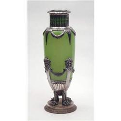 A WMF style green glass and silver plated vase mounted with crisply cast shoulder, on circular ba...