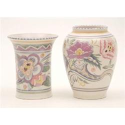 Two Poole Pottery vases, one ovoid, the other everted cylindrical, both painted with stylised fol...