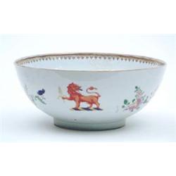 A 19th century Samson porcelain fruit bowl enamelled with armorial lion and flower sprays, 12ins...