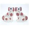 Image 1 : A pair of Victorian style comforter spaniels, coloured in rust enamel, 11ins £100-150...