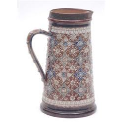 A Doulton Lambeth tapered cylindrical jug with geometric relief moulded decoration, dated 1878, 9...