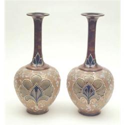 A pair of Doulton Slaters Patent vases with long slender necks, 15ins £250-300...