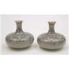 Image 1 : A pair of Japanese cloisonne bottle vases of compressed form, with seaweed decoration on a green...