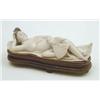 Image 1 : A Japanese erotic carved ivory figure of a reclining nude woman holding a fan, on a hardwood stan...