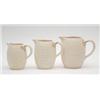 Image 1 : A set of 3 Clarice Cliff graduated jugs, with corn on the cob type bodies, largest 6.5ins £150-20...