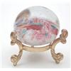 Image 1 : A small multi cane glass paperweight with later gilt metal tripod stand, 2ins £60-80...