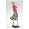 Image 1 : A Goldscheider Dakon figure of a lady golfer with red shirt and plaid skirt, 11.25ins  (see illus...