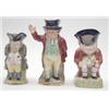 Image 1 : A snuff taker Toby jug, another of Mr.Pickwick and another of Toby, 6ins £100-150...