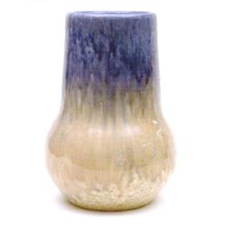 A Ruskin low fired vase with a blue and cream trailed glaze, impressed date 1930 and signature W....