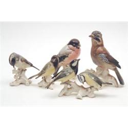 A German porcelain woodpecker and 4 other birds £80-120...