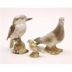 A Beswick wood pigeon No.1383, a kookaburra No.1159 and a goldcrest No.2415 £60-80...