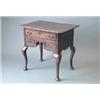 Image 1 : An early 18th century oak lowboy with moulded top and 3 mahogany banded drawers over a shaped apr...
