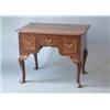 Image 1 : An early 18th century oak lowboy with rounded rectangular top, 3 drawers fitted original brass ha...