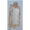 Image 1 : A George III giltwood wall mirror with flowers in basket crest and original flower and scroll bor...