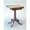 Image 1 : A Regency rosewood occasional table with scroll end frieze drawer, octagonal stem and beaded plat...