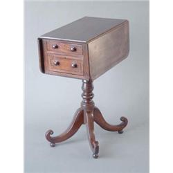A Regency mahogany work table with D shaped flaps and 2 drawers, on turned column and scroll legs...