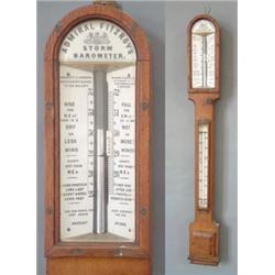 A late Victorian Admiral Fitzroy Storm Barometer with ceramic dial, signed Negretti & Zambra, the...