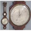 Image 1 : A George III mahogany wheel barometer with damaged swan's neck pediment, thermometer, convex mirr...