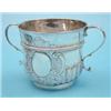 Image 1 : A Queen Anne Britannia standard silver porringer with scroll handles, demi-fluted body and foliat...