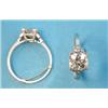 Image 1 : A platinum set solitaire diamond ring with diamond set stepped shoulders, the old brilliant cut s...