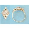 Image 1 : An 18ct gold and platinum 9-stone diamond flowerhead cluster ring with diamond set shoulders  (se...