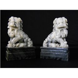 Pair of Chinese carved grey Foo Dogs