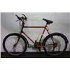 Image 3 : 2 BIKES : RED NORCO MOUNTAINEER MOUNTAIN BIKE & A ORANGE NORCO BUSH PILOT MOUNTAIN BIKE
