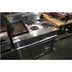 GARLAND STAINLESS STEEL 4 BURNER ELECTRIC OVEN WITH 12" GRIDDLE