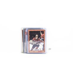 Bundle of assorted sports collectors trading cards