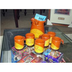 Hand crafted pottery jug and cup set; 7pcs
