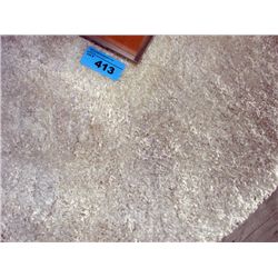Approx 9F by 11F off white shag area rug