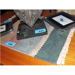 Small 100% wool hand knotted throw rug