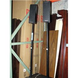 Pair of panasonic home audio speakers on stands