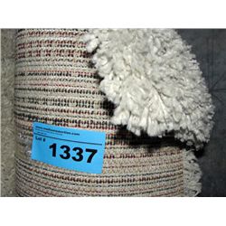 Small off white shag area rug